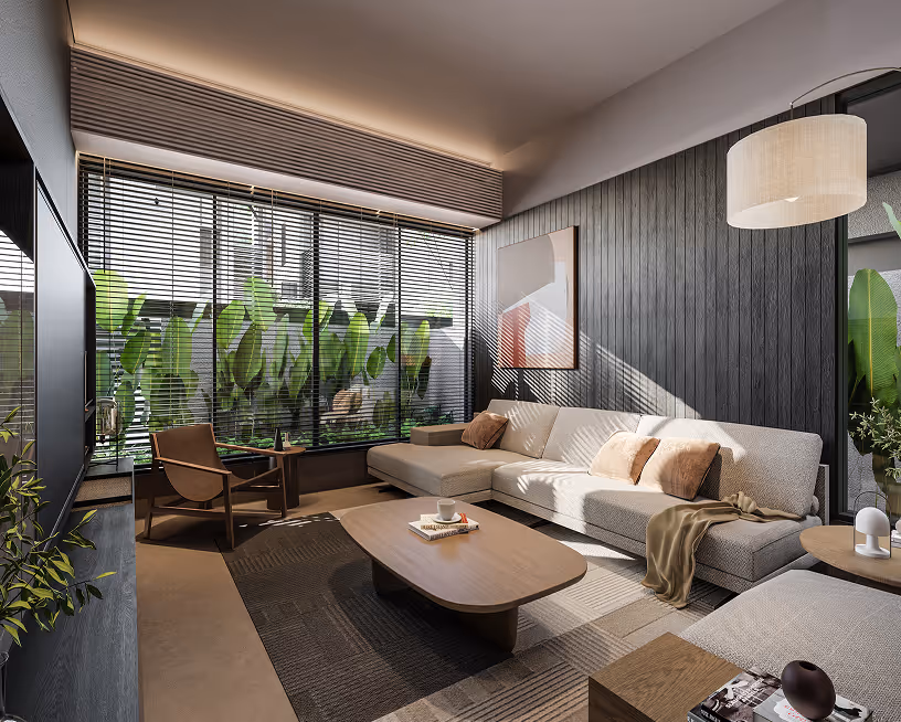 A living room inside an H4 villa, opening to a covered terrace.