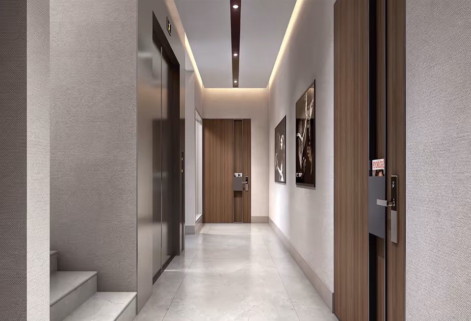 An internal corridor in Meraki, lined in timber panelling.