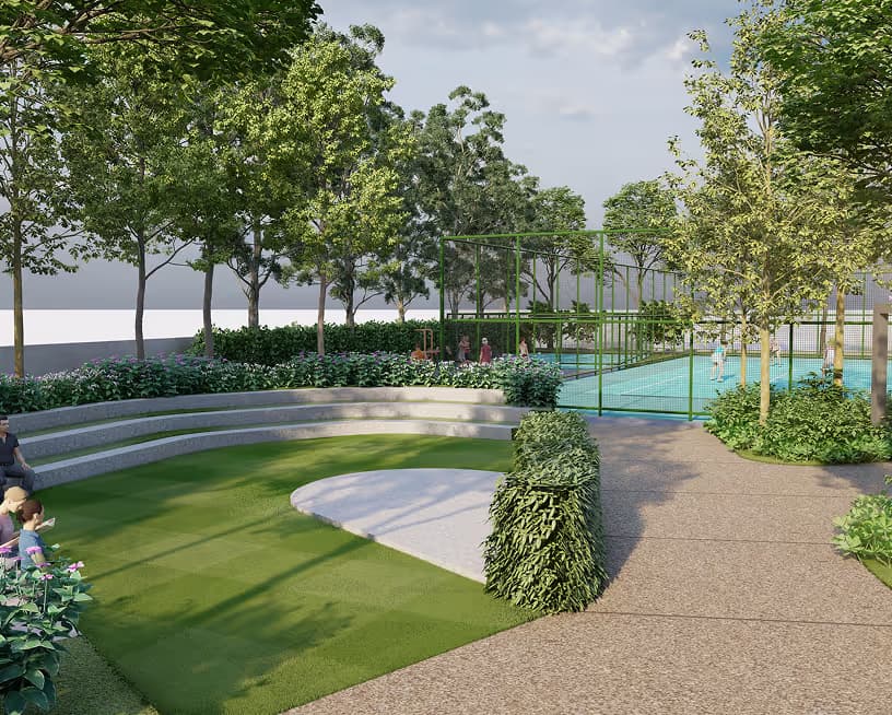 Lawn and young trees beside a Rare Earth walkway.