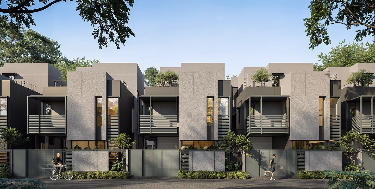 An H4 villa in pale stone and glass, planting spilling from its upper terraces.