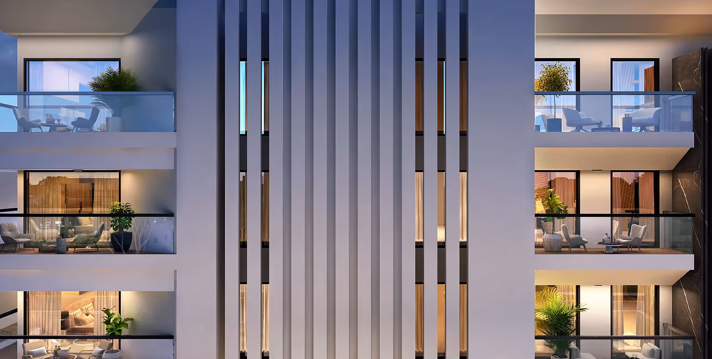 The entrance doors to Meraki, in ribbed timber with vertical metal pulls.